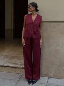Women's burgundy 2-piece set featuring a tailored V-neck vest and high-waist wide-leg trousers