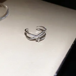 Bague fleurs en zircon avec pendentif étoile scintillante en finition argent