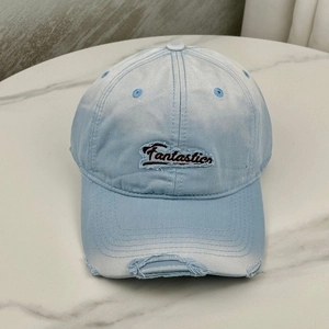Distressed light blue baseball cap with Fantastics embroidery and vintage frayed brim