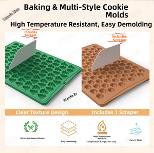 Detail of Christmas tree and nut silicone baking mats with a heat-resistant scraper