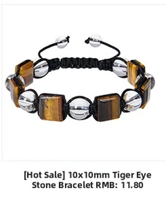 Detailed view of 10mm tiger eye stones and braided rope on adjustable beaded bracelet