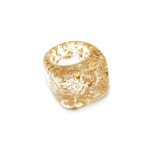 Minimalist square resin ring set featuring shimmering gold foil flakes on white background