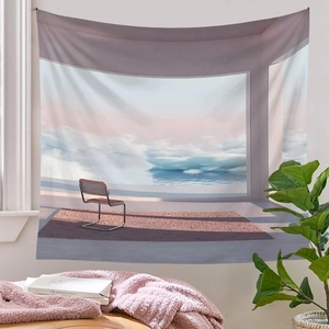 Detail of minimalist landscape tapestry featuring a purple sunset and modern interior decor