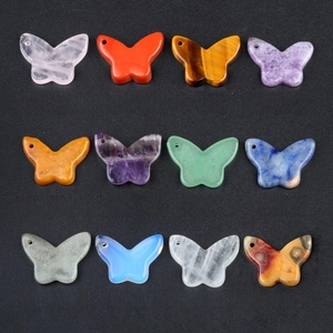 Twelve natural crystal butterfly pendants in various colorful stones for DIY jewelry making