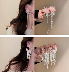 Detail showing elegant flower crystal tassels and bow pearl fringe long earrings