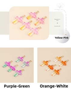 Detailed view of colorful gradient crystal cross pendants with golden metal clasps