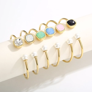 Fashionable gold open rings set with square colored stones and white pearls for women
