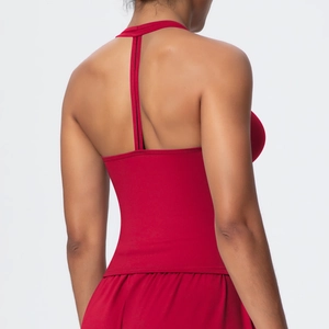 Close-up of a dark red yoga sports bra featuring a vertical strap back and slim fit