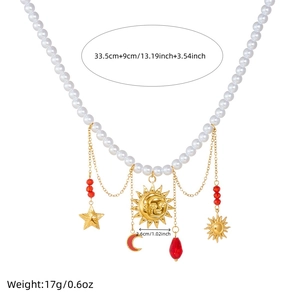 Layered pearl chain necklace with gold celestial sun star and moon charms pendant