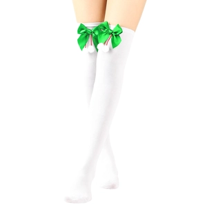 Close-up of white over-the-knee Christmas socks with green satin bows and white fuzzy balls