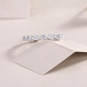 Macro shot of 925 sterling silver ring featuring marquise-shaped moissanite stone setting