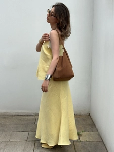 Chic light yellow cotton linen set with camisole and fishtail skirt for summer