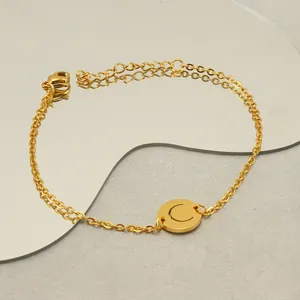 Minimalist gold titanium steel chain bracelet featuring a round hollow letter C pendant
