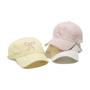 Women's cotton baseball caps in pastel colors featuring a pink bow embroidery detail