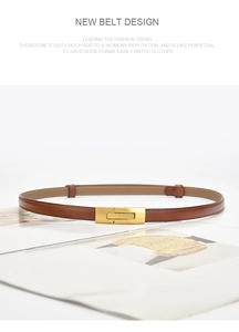 Detail of slim caramel leather belt with a gold rectangular buckle on a white background
