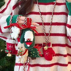 Christmas flocculation pendant necklaces featuring festive cartoon plush charms on woven cords