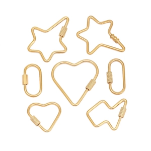 Detailed macro view of gold-plated stainless steel carabiners in star and heart shapes