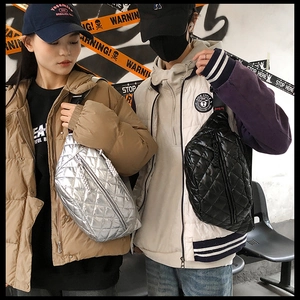 Quilted crossbody waist bags in black and silver shown on models in a street style setting
