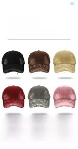 Detailed close-up of distressed cotton baseball caps in six vintage washed color options