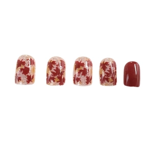 Short square press-on nails with autumn maple leaf patterns and sparkling glitter finish
