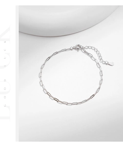 Close-up of S925 sterling silver paperclip chain bracelet with a heart charm and adjuster