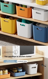 Multi-colored plastic storage boxes with cutout handles for organized home cabinets