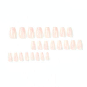 Set of 24 nude pink ballet shape false nails with a translucent jelly finish on white background