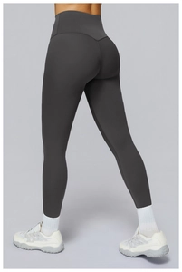 Detailed back view of high-waisted charcoal grey yoga pants with booty lifting design
