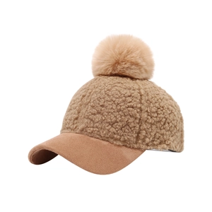 Brown fleece baseball cap with large pompom and suede brim for kids in autumn and winter