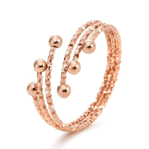 Elegant 18K rose gold plated triple layer stainless steel ring with textured beads