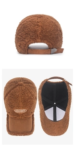 Détail de la casquette de baseball en peau de mouton marron avec broderie Goodboy