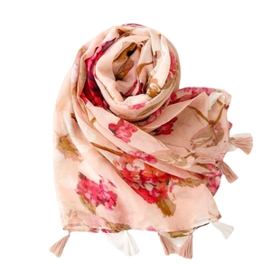 Pink floral cotton linen scarf with elegant tassel edges on white background