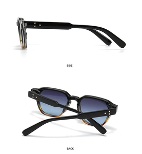Side and back view of retro black narrow sunglasses with gold star rivets and gradient lenses