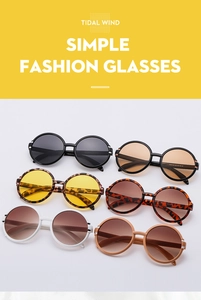 Detailed array of vintage round frame sunglasses in six colors with metal stripe accents