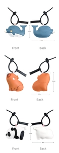 Detail view of cartoon animal leather charms with adjustable straps in multiple styles