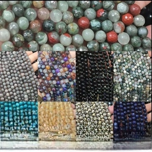 Detailed view of assorted faceted natural stone beads for DIY jewelry making