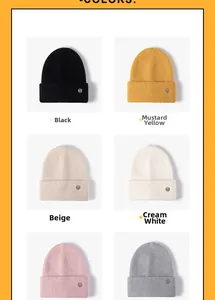 Detailed grid view of thick knit beanies in six colors with metallic M logo badges