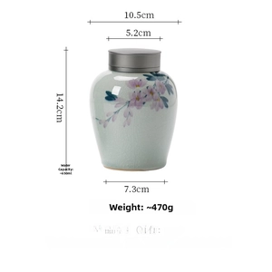 Detail view of a hand-painted ceramic tea canister with capacity and size measurements