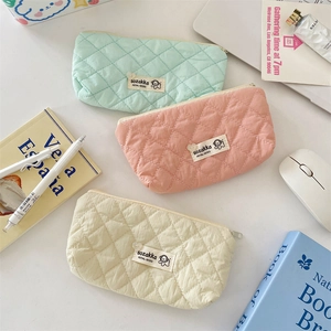 Quilted macaron color stationery pouches in mint, pink, and white for students