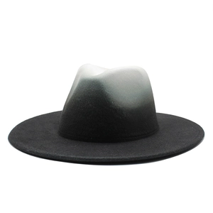 Detail of a two-tone gradient wool fedora hat transitioning from white to black