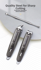 Close-up of three-piece stainless steel manicure set with matte grey coating handles