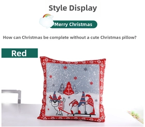 Close-up of a red Christmas pillow cover with gnome and puppy on linen texture fabric