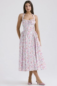 Detailed close-up of summer halter maxi dress with purple and orange floral print and pleats