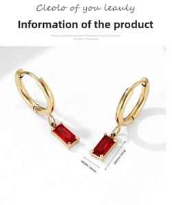 Detail view of 24mm gold plated hoop earrings with red zircon stones and size specs