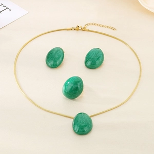 Chic gold snake chain jewelry set with green marble enamel finish including ring and earrings