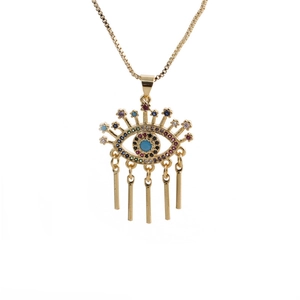 Golden Evil Eye necklace with colorful rhinestones and metallic tassels on white background