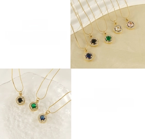 Detailed macro view of titanium steel necklaces with colorful circular zircon pendants