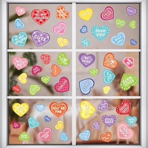 Colorful heart static window clings with festive phrases for Valentine's glass decoration