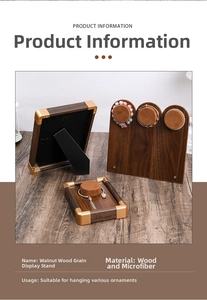 Detail of walnut wood jewelry display set with microfiber pads and gold metal corner guards