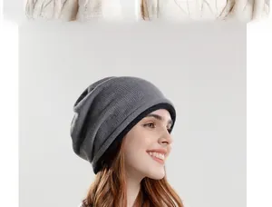 Detail of dark grey knitted beanie featuring double-layer design and fine ribbed texture